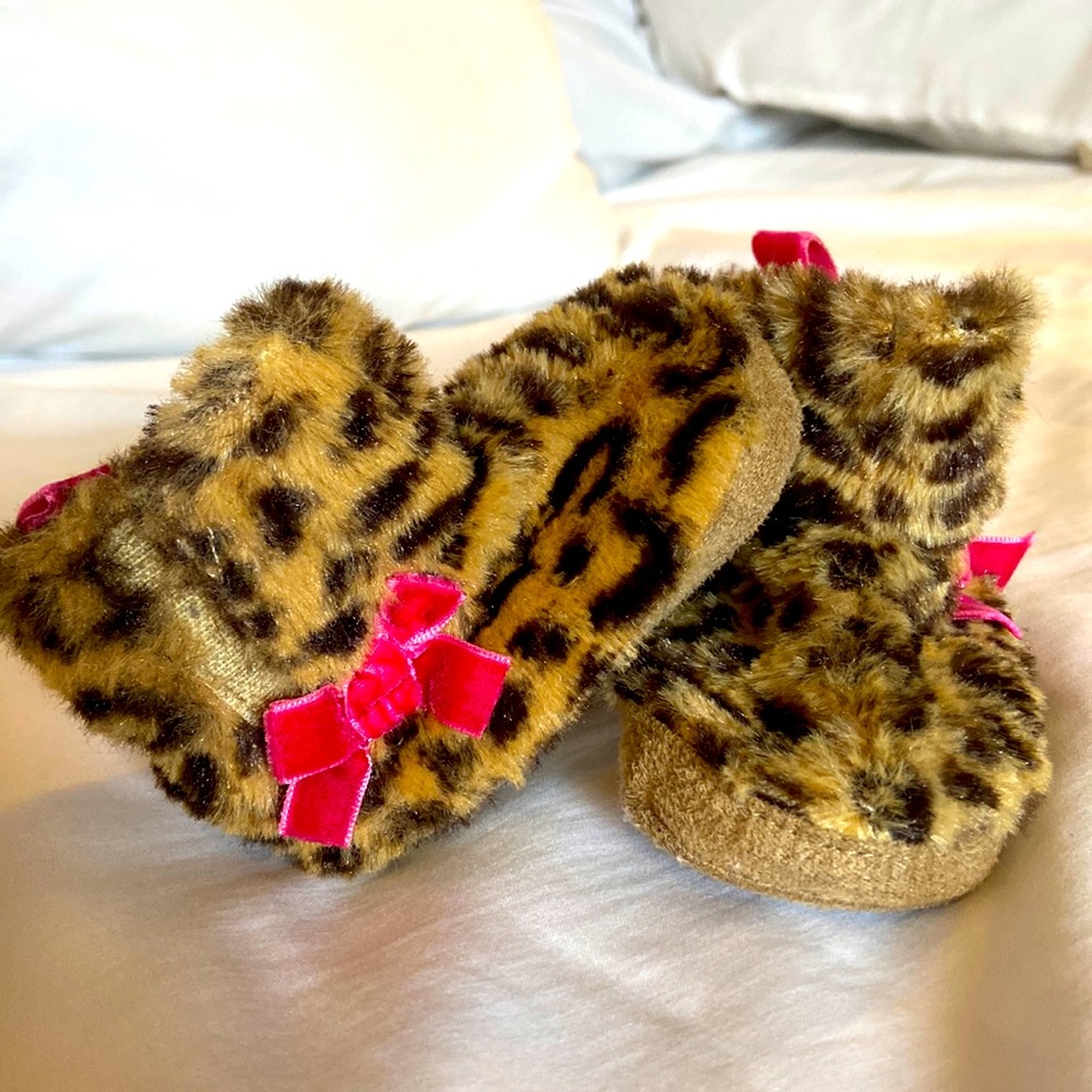 Cheetah boots with pink velvet bow